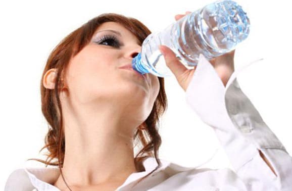 woman-drinking-water-from-a-bottle