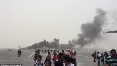 Passengers sprint down runway just minutes before Emirates jet explodes after crash