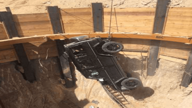 car falls in to the pit dug for construction works