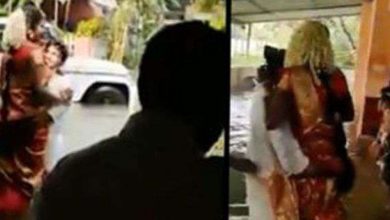 Video of groom holding bride in arms in floods went viral