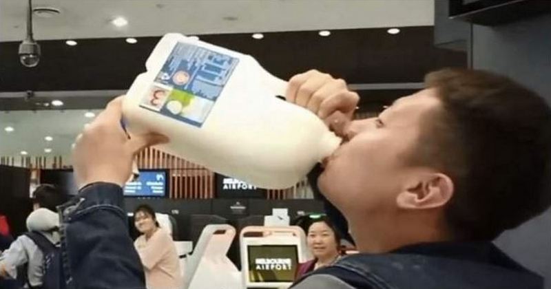 man drink milk