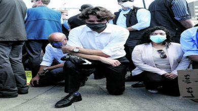 CANADIAN PM Justin Trudeau kneels